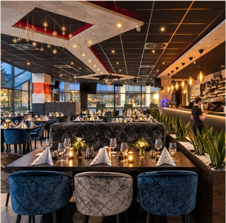 Stimmungsvoller Innenraum des FAME Restaurants in Suhl mit gedeckten Tischen